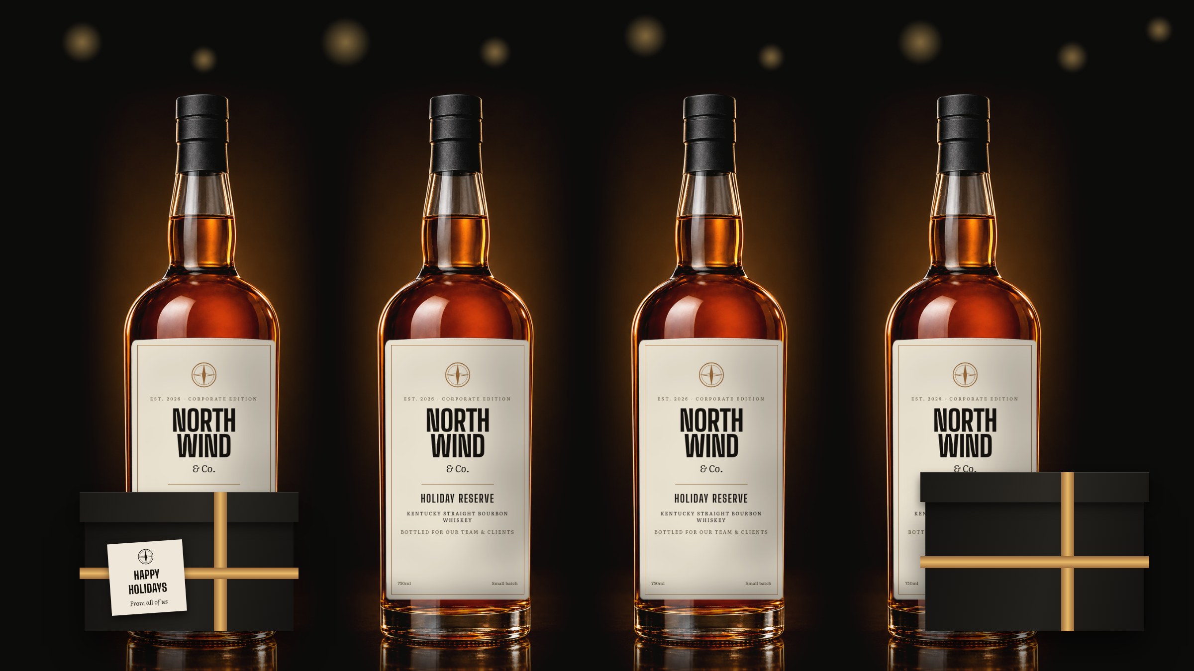 Three whiskey bottles with custom labels, surrounded by black gift boxes tied with gold ribbon.